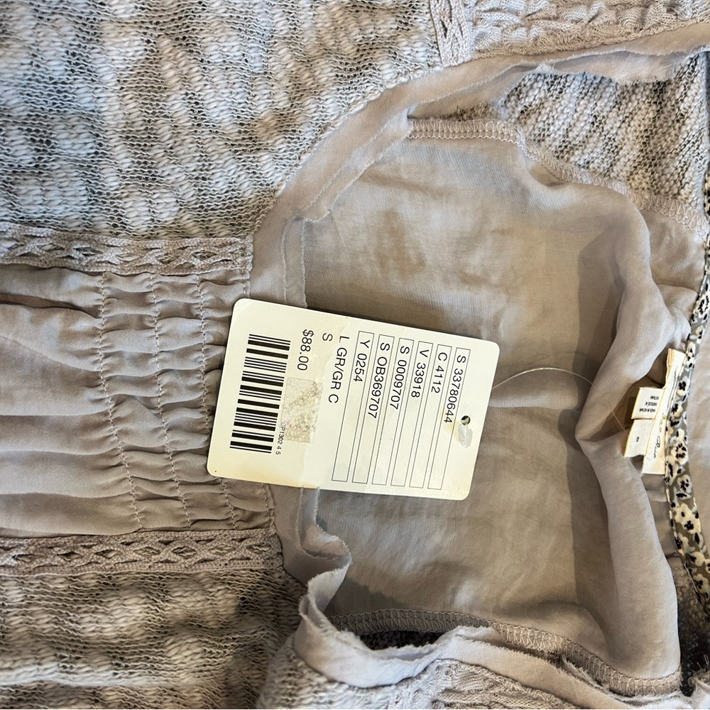 Brand new Free People lavender shirt. Never worn, still have tags.